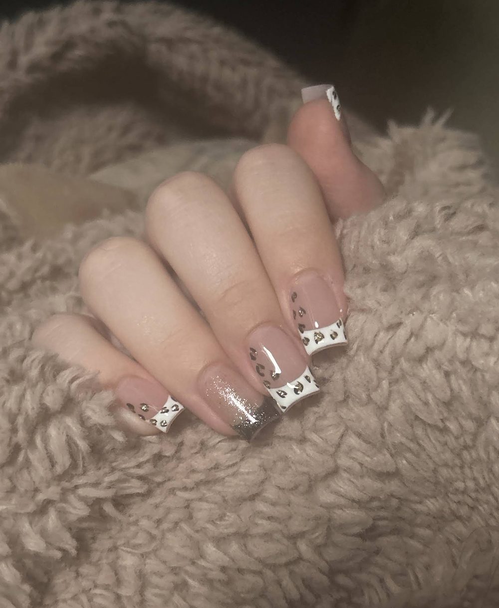 White leopard French-tip nails shared by a Pedi N Nails London guest