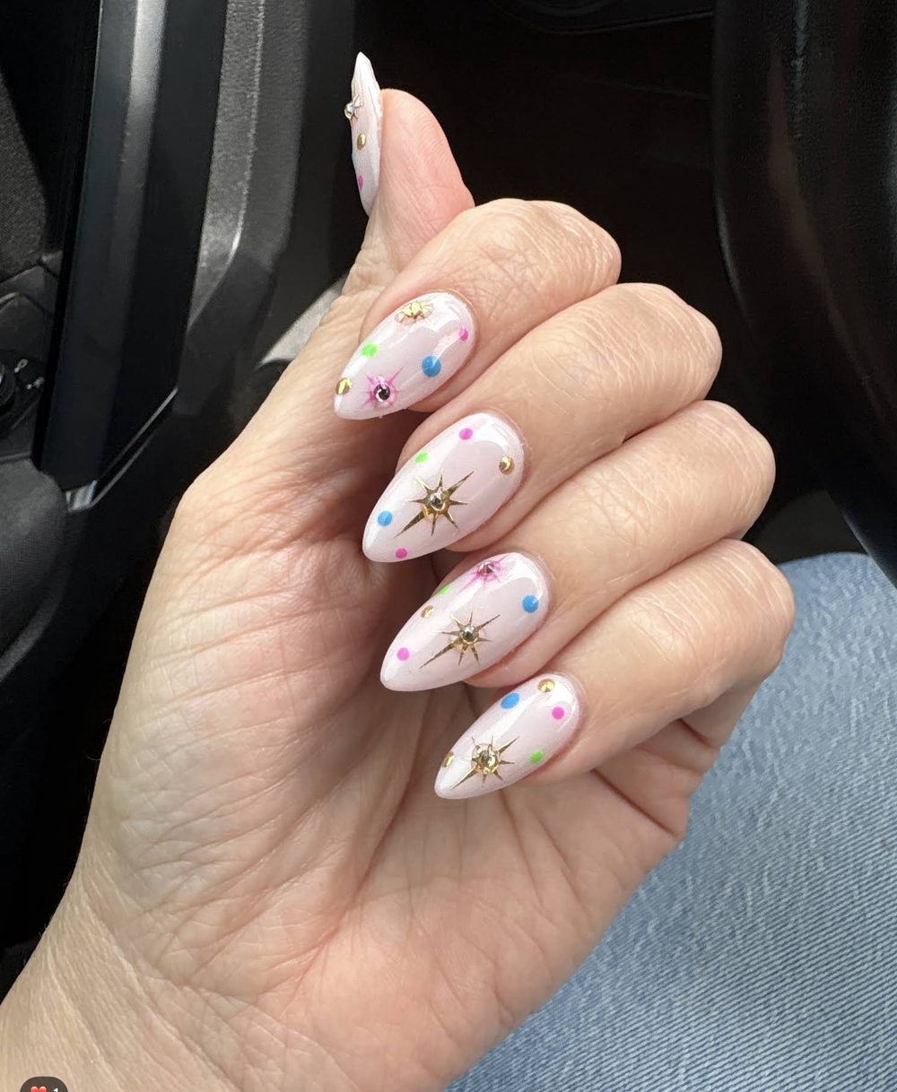 Pastel celestial star nail art shared by a Pedi N Nails London guest