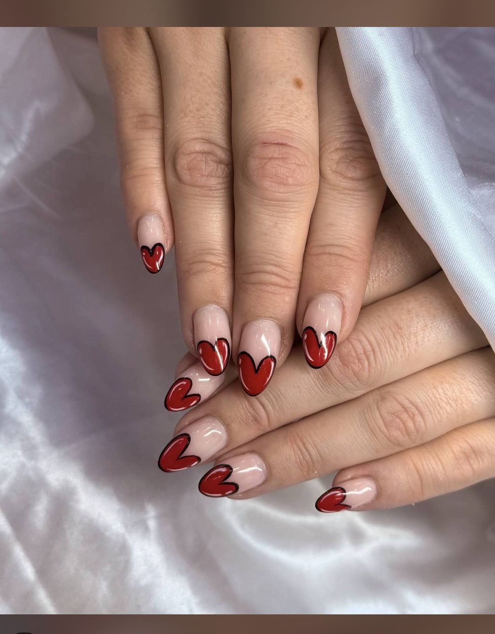 Red heart French nails shared by a Pedi N Nails London guest