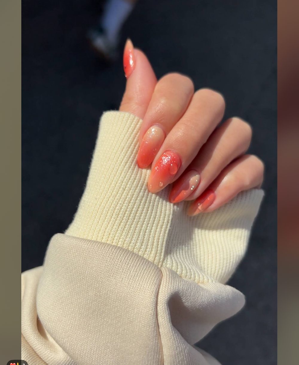 Peach ombré nails shared by a Pedi N Nails London guest